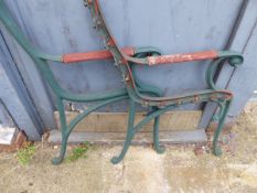 A PAIR OF CAST IRON BENCH ENDS.