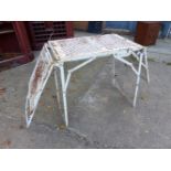 AN UNUSUAL PAINTED WROUGHT IRON FOLDING TABLE.