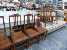 A SET OF SIX ARTS AND CRAFTS OAK DINING CHAIRS.