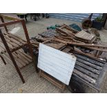 TWO GARDEN LOUNGERS, STACKING CHAIRS, A POTTING STAND ETC.