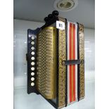 A VINTAGE ACCORDIAN.