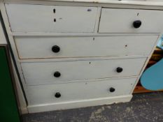 A VICTORIAN PAINTED PINE CHEST OF DRAWERS.
