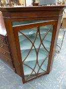 ANTIQUE OAK GLAZED CORNER CABINET.