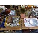 A QUANTITY OF SILVER PLATED WARES, CUTLERY, TABLE LAMPS, CANDLE STICKS ETC.