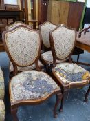 A SET OF FOUR FRENCH STYLE SHIELD BACK SIDE CHAIRS.