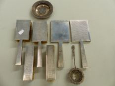 AN ART DECO HALLMARKED SILVER DRESSING TABLE SET, A SILVER ARMADA DISH, AND A WHITE METAL ORNATE TEA