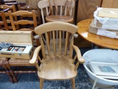 A SMALL PINE BREAKFAST TABLE, FOUR SIDE CHAIRS, TWO ARMCHAIRS, AND A BENTWOOD CHAIR.