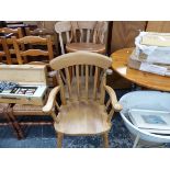 A SMALL PINE BREAKFAST TABLE, FOUR SIDE CHAIRS, TWO ARMCHAIRS, AND A BENTWOOD CHAIR.