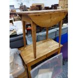 A SMALL ANTIQUE PINE DROP LEAF TABLE AND A KITCHEN WORK UNIT.