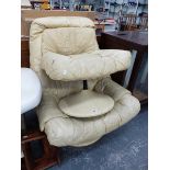 AN ITALIAN DESIGNER LEATHER SWIVEL CHAIR AND STOOL.