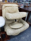 AN ITALIAN DESIGNER LEATHER SWIVEL CHAIR AND STOOL.