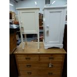 TWO PAINTED BEDSIDE CABINETS, A SMALL ASH CHEST OF DRAWERS, TWO FOLDING TABLES, AND A WICKER HAMPER.