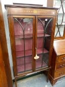 AN EDWARDIAN INLAID DISPLAY CABINET.