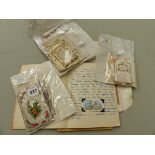 A COLLECTION OF VINTAGE PIERCED PAPER SWEET HEART CARDS, CIGARETTE SILKS ETC.