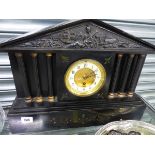 A LARGE VICTORIAN BLACK SLATE MANTLE CLOCK.