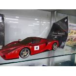 A TAMIYA SCALE MODEL ENZO FERRARI COMPLETE WITH ORIGINAL BOX AND A MOTOR MAX MERCEDES- BENZ SLR 1:12
