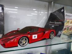 A TAMIYA SCALE MODEL ENZO FERRARI COMPLETE WITH ORIGINAL BOX AND A MOTOR MAX MERCEDES- BENZ SLR 1:12