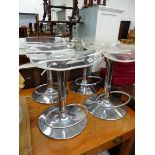 A SET OF FOUR CHROME RETRO ADJUSTABLE STOOLS.