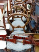 A SET OF FOUR VICTORIAN BALLOON BACK CHAIRS.