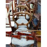 A SET OF FOUR VICTORIAN BALLOON BACK CHAIRS.