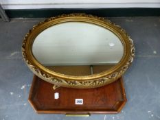 AN OAK TEA TRAY AND A GILT FRAMED MIRROR.