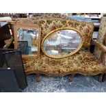 A FRENCH STYLE WALNUT FRAMED SALON SETTEE.