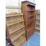 A PINE WATERFALL BOOKCASE, AND ANOTHER BOOKCASE ON CABINET.
