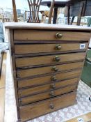 A SMALL ANTIQUE COLLECTORS CHEST.