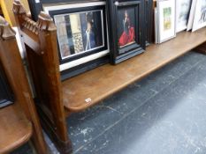 A VICTORIAN GOTHIC OAK PANEL END PEW.