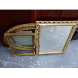 TWO GILT FRAMED MIRRORS AND A FRAME.