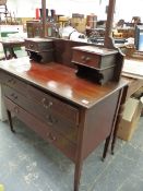 AN EDWARDIAN MAHOGANY DRESSING CHEST.