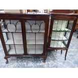 AN EDWARDIAN INLAID DISPLAY CABINET AND A LATER MAHOGANY DISPLAY CABINET.