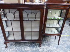 AN EDWARDIAN INLAID DISPLAY CABINET AND A LATER MAHOGANY DISPLAY CABINET.