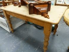 A PINE KITCHEN TABLE.