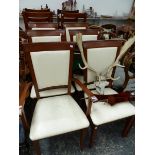 A SET OF SIX MODERN DINING CHAIRS.