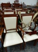 A SET OF SIX MODERN DINING CHAIRS.