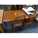 ERCOL ELM DINING TABLE, TWO ERCOL ARM CHAIRS, AND SIX SIMILAR SPINDLE BACK CHAIRS.