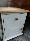 A PAINTED BEDSIDE CABINET.