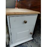 A PAINTED BEDSIDE CABINET.