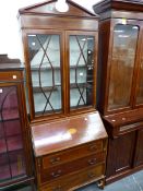 AN EDWARDIAN MAHOGANY AND INLAID BUREAU BOOKCASE.