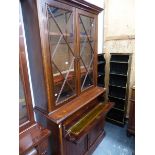 A LATE VICTORIAN MAHOGANY SECRETAIRE BOOKCASE.