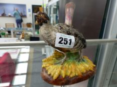 A PAIR OF ANTIQUE PORCELAIN BIRD FIGURES.