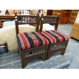 A PAIR OF MOORISH STYLE LOW BACK STOOLS.