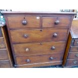 A VICTORIAN MAHOGANY CHEST OF DRAWERS.