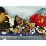 A PADDINGTON BEAR TOY AND OTHER SOFT TOYS.