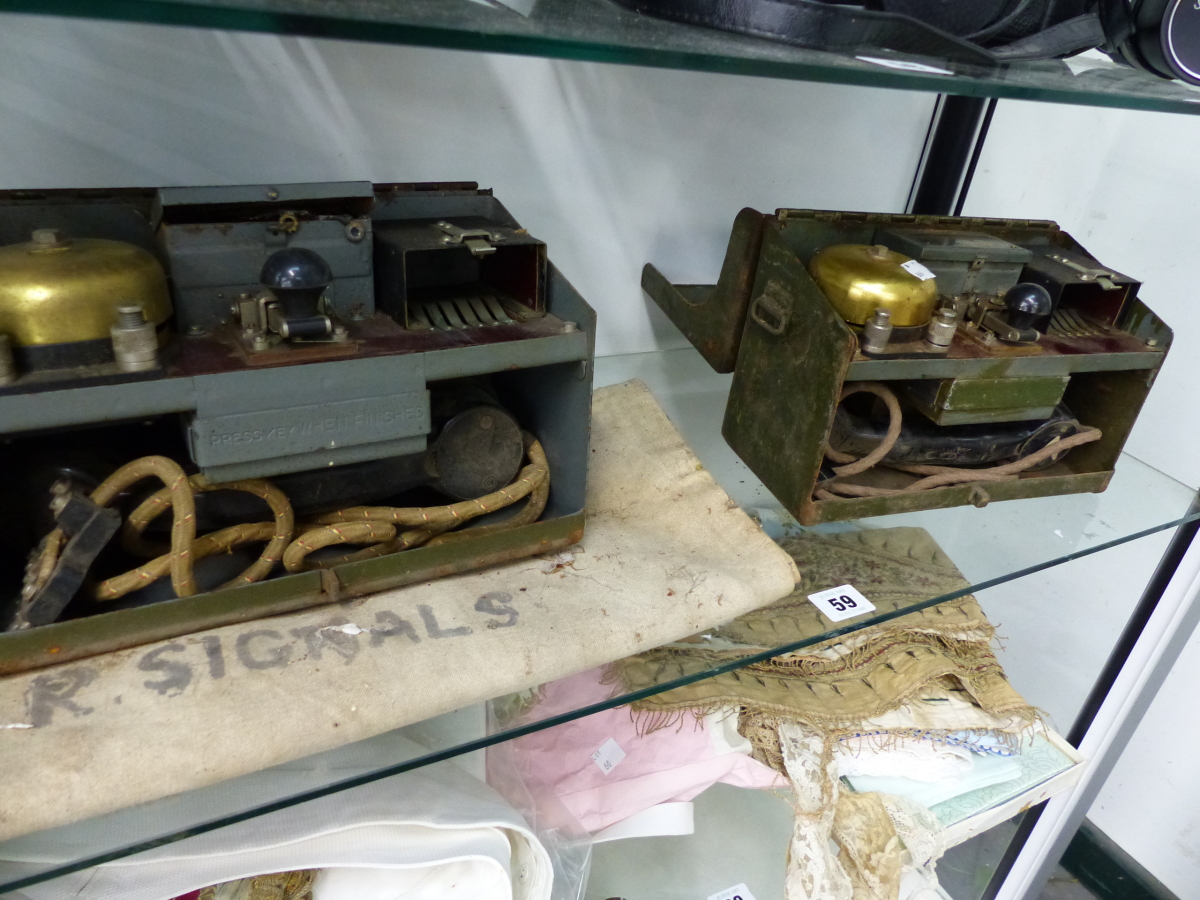 TWO VINTAGE MILITARY FIELD TELEPHONES.