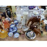 A QUANTITY OF VARIOUS DECORATIVE CHINA WARES, HUMMEL FIGURINES, THREE DECANTERS, VASES ETC.