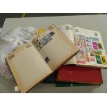 VARIOUS STAMP ALBUMS AND A LARGE QUANTITY OF LOOSE STAMPS.
