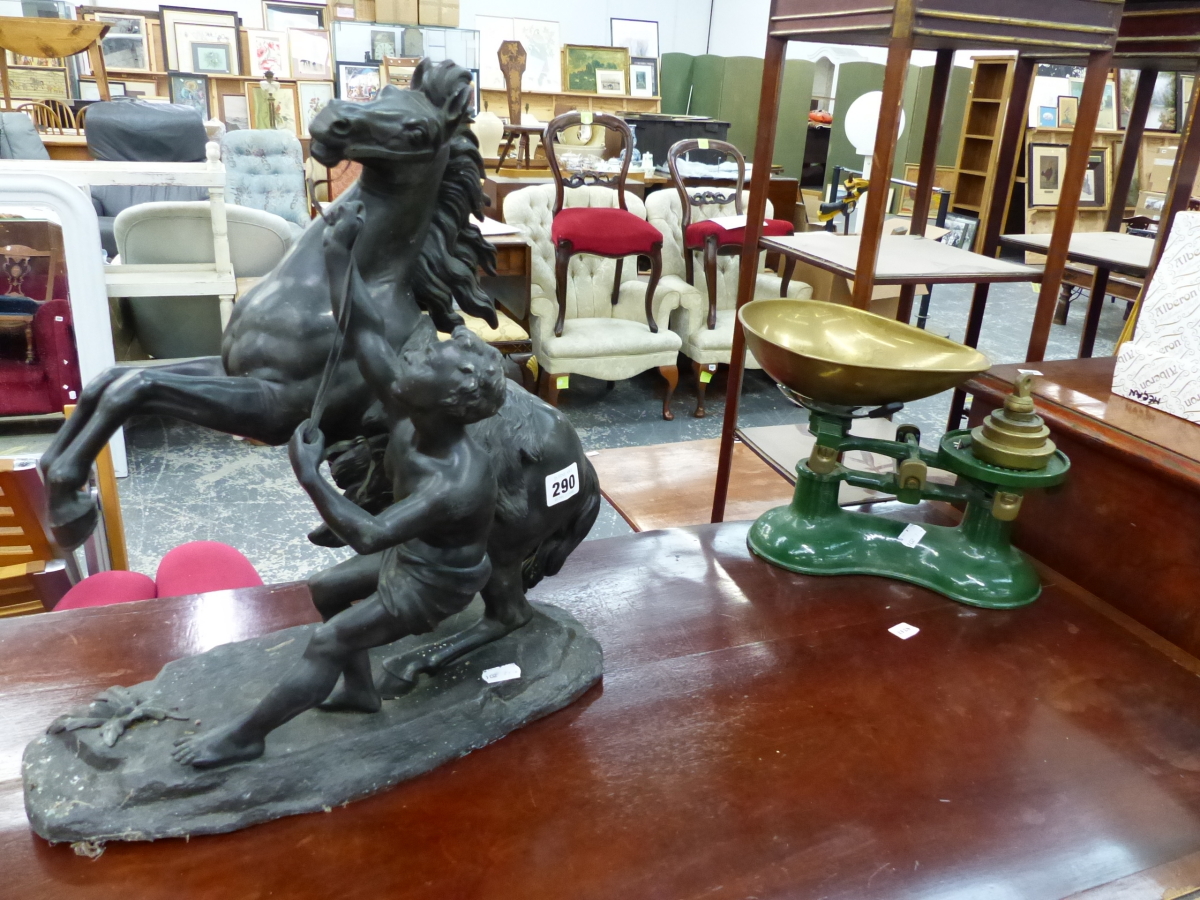 AN ANTIQUE MARLEY HORSE FIGURE, AND A SET OF KITCHEN SCALES.