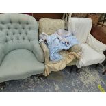 A LATE VICTORIAN BUTTON BACK ARMCHAIR AND TWO LATER ARMCHAIRS.